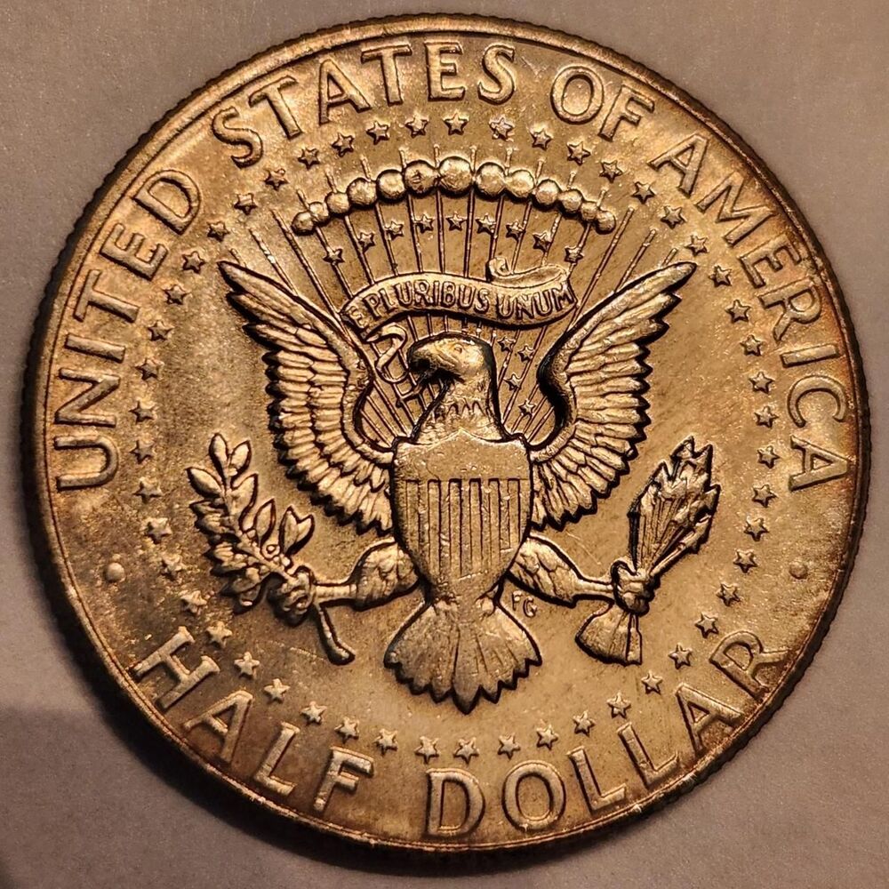 This coin is a 1966 Kennedy Half Dollar in...